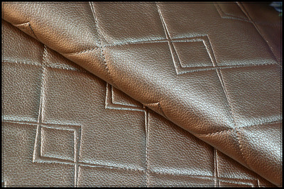 廠家直銷現(xiàn)貨供應(yīng)移門PU面料與硬包皮革裝飾革 環(huán)保阻燃皮料的全方位解析